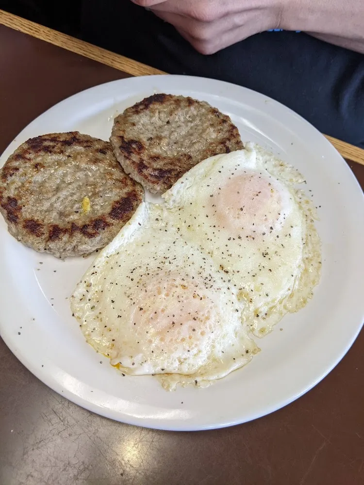 Two Sausage Patties with over Medium Eggs